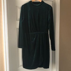 Emerald green velvet dress